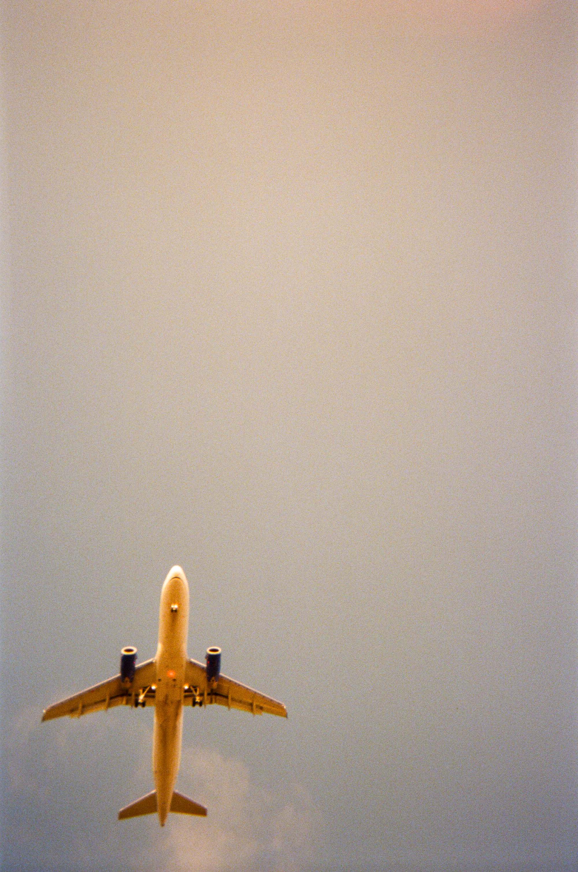 Airplane silhouette against dramatic sky - fine art photography