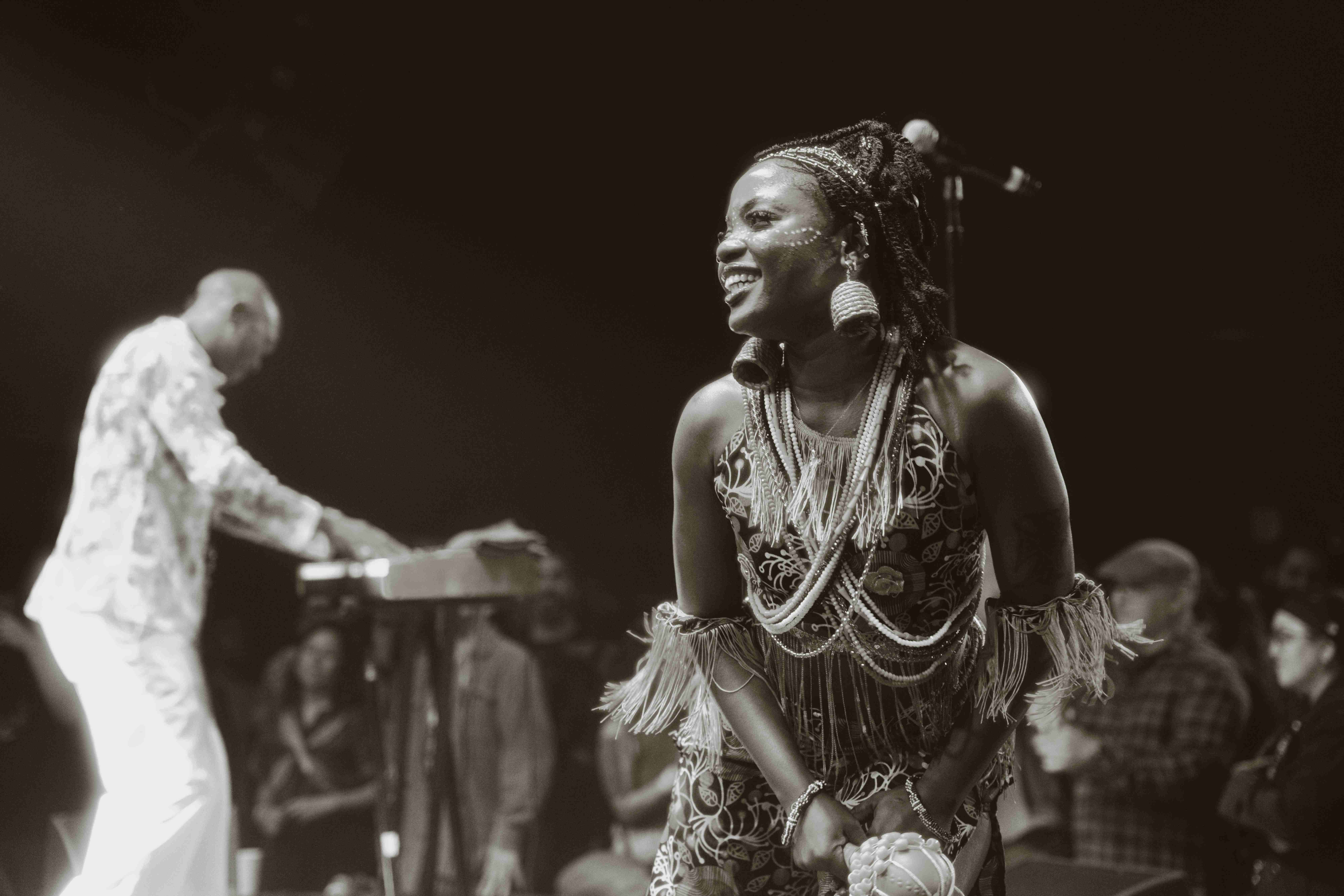 Black and white portrait of a smiling dancer
